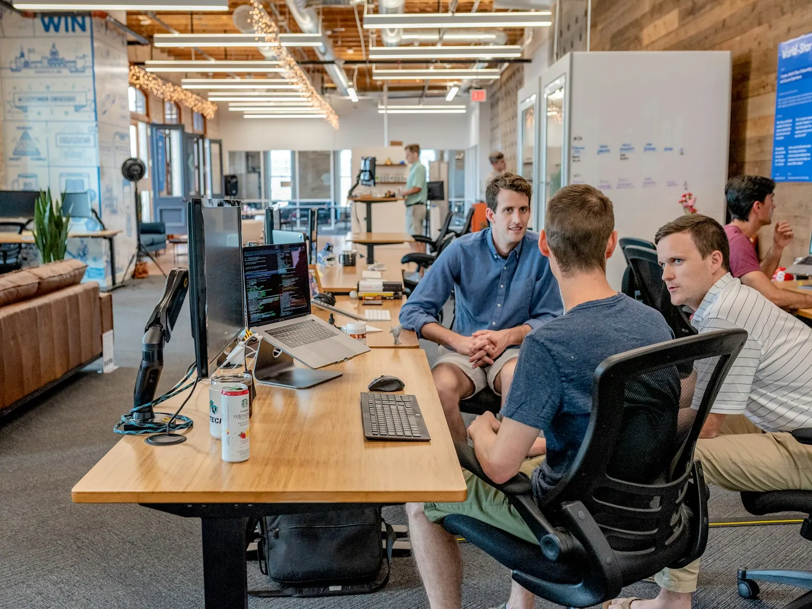 A team working together in a bright open-plan office